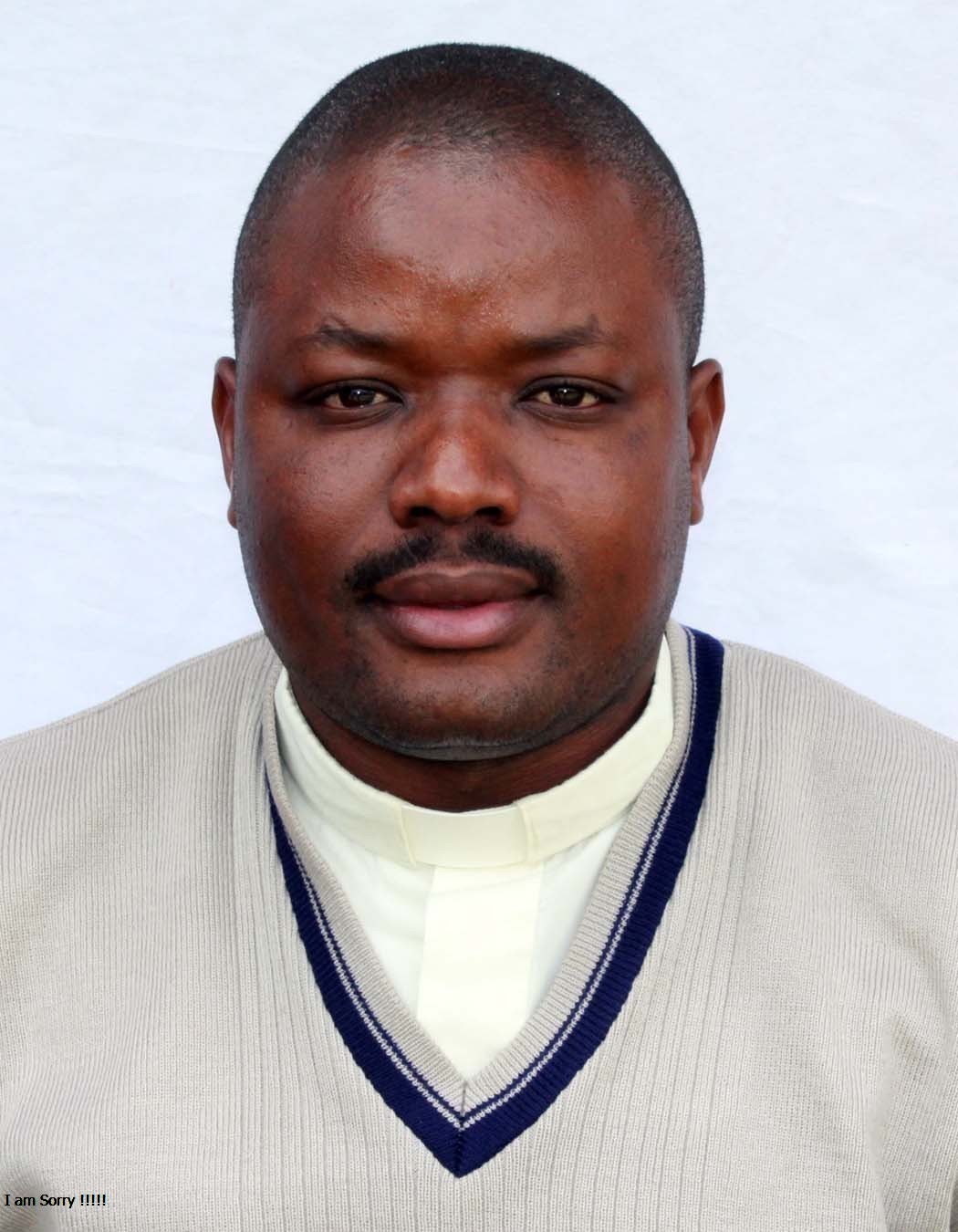 Fr. Kenneth  Beingana